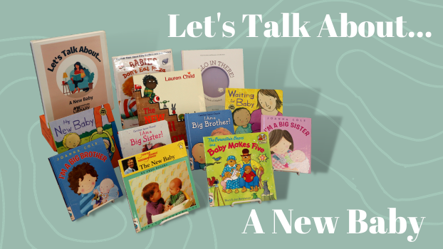 Twelve children's picture books and a binder propped on easels. The binder is labeled "Let's Talk About... A New Baby"