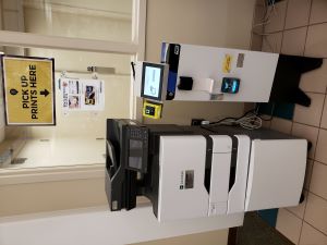 Printer and copy with kiosk to pay for prints