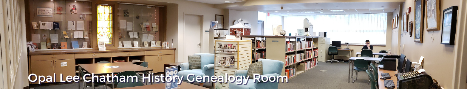 Local history and genealogy room filled with book collection and table and chairs