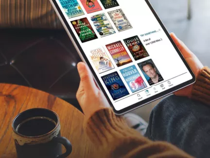 A collection of top ebook readers from 2020 displayed on a table, showcasing their sleek designs and features.