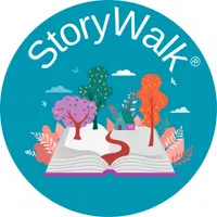Storywalk with open book and trail depicting adventure